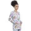 image:imageCherokee Printed Women Warm Up Scrub Jacket with 2 PocketsFriendly Flowers